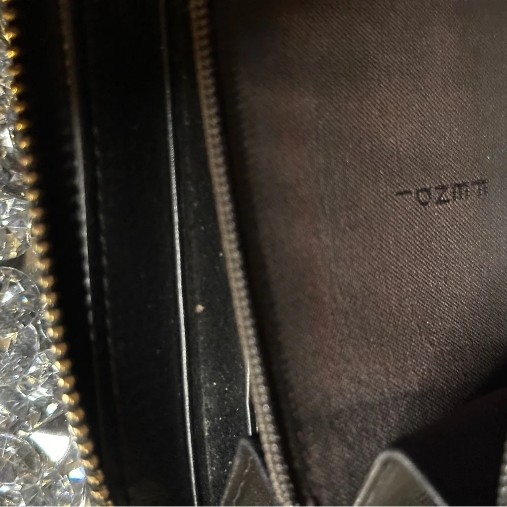 Vintage Fendi black patent leather zip-around continental wallet.
